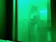 Slutty whore takes a shower in the hotel bathroom before fucking her lover