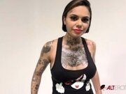 'Interview with busty tattooed babe Genevieve Sinn'