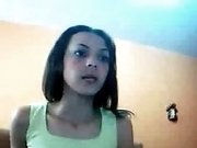 Dainty Latina brunette webcam girl fingers her tight bald snapper