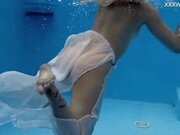 'Finnish hottest pornstar Mimi swims nude in the pool'