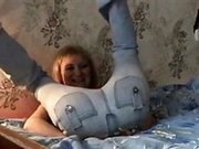 Blonde girl farting in tight jeans