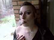 'Punk  Smokes a Cigarette in Latex & Leather - Milk Rebelle'