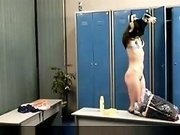 Curvy brunette MILF changes her clothes in the GYM locker room