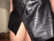'dominant wife in leather skirt taken on a table - hugh cumload on her sexy leather high heel boots'
