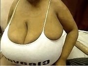 Megabusty amateur mature lady on webcam shows her titties