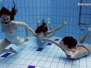 Three girls with Matrosova in swimming pools